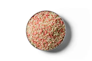 Cropmaster 11 fertiliser granules in a round dish