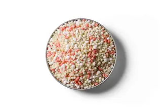 Cropmaster 15 fertiliser granules in a round dish