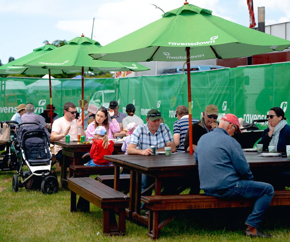 Canterbury A&P Show, Shareholders Enjoying Ice Cream, Drinks And Coffee Under The Ravensdown Umbrellas