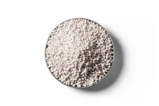 Zinc Sulphate – Fert Grade fertiliser granules in a round dish