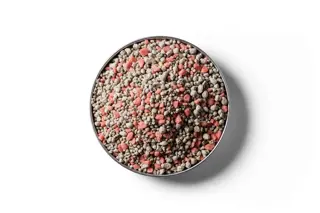 30% Potash Sulphur Super fertiliser granules in a round dish