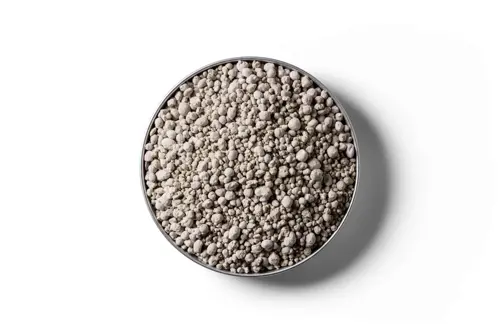 Sulphur Super 15 fertiliser granules in a round dish