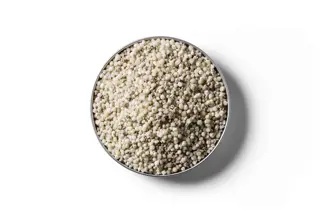 DAP 13S fertiliser granules in a round dish